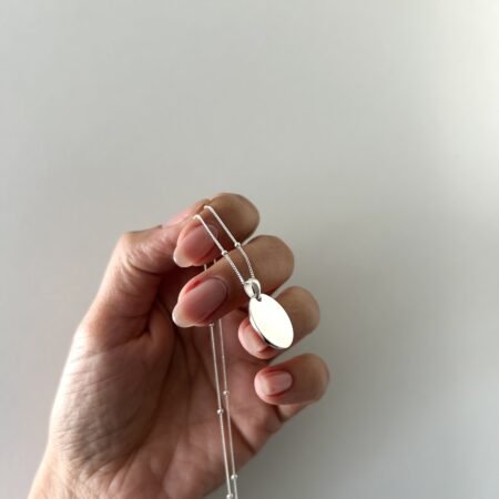 Conjunto medalla oval plata 925