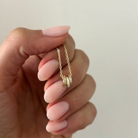 Colgante triple dona plata 925 y baño de oro 18 k