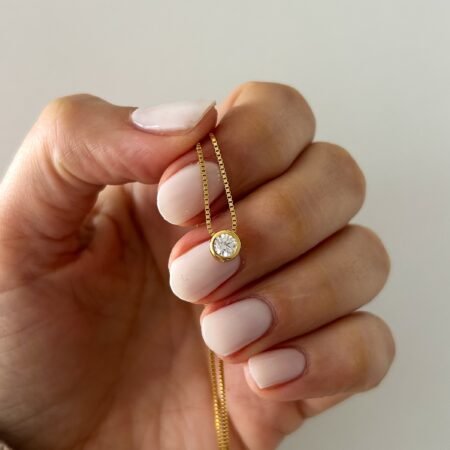 Colgante punto de luz plata 925 y baño de oro 18