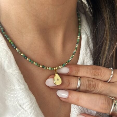 Colgante piedra turquesa baño de oro 18 k